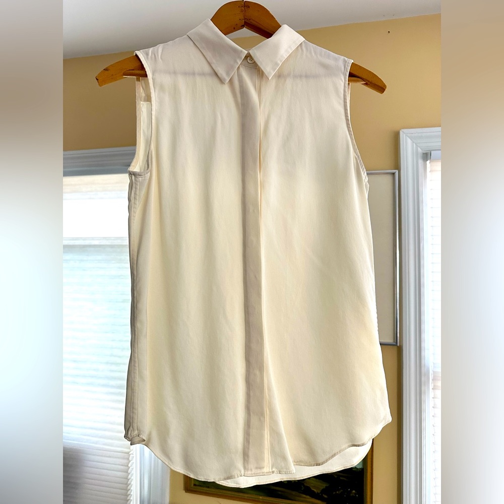Sleeveless 100% silk cream colored button down shirt